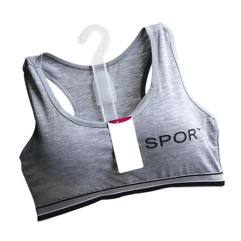 Gray sports quick-drying elastic top-bra with lining on hanger, perfect for women's fitness routines; breathable and comfortable.
